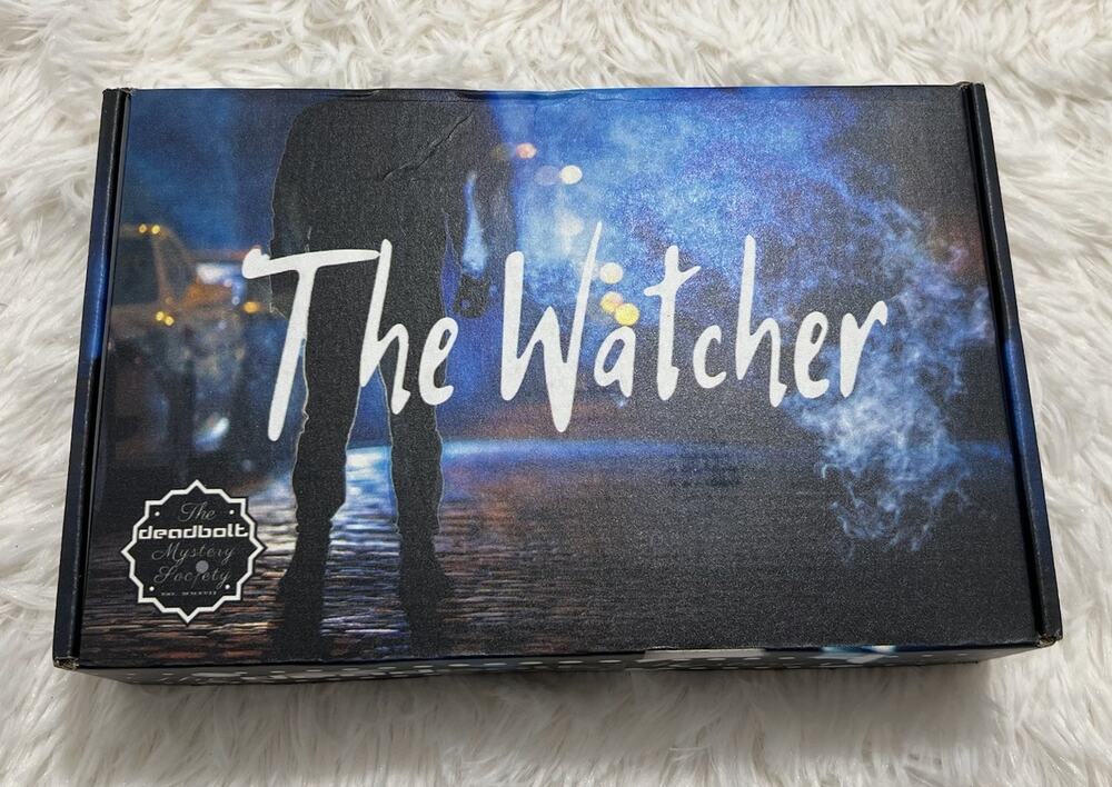 The Deadbolt Mystery Society “The Watcher” Mystery Game New Box Interactive